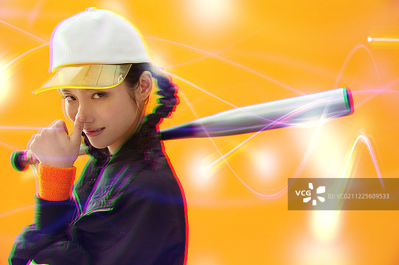 年轻女孩打棒球图片素材