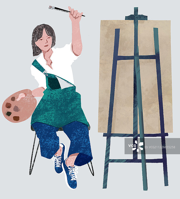 手拿画笔画油画的女学生图片素材