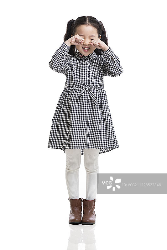 可爱的小女孩做鬼脸图片素材