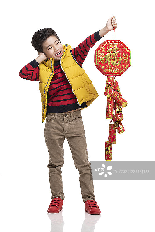 快乐的小男孩庆祝新年图片素材