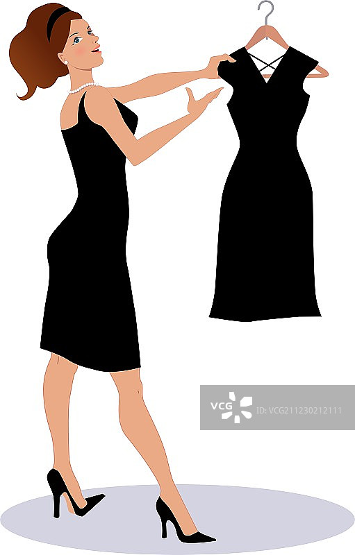 女销售员展示一件小黑裙图片素材