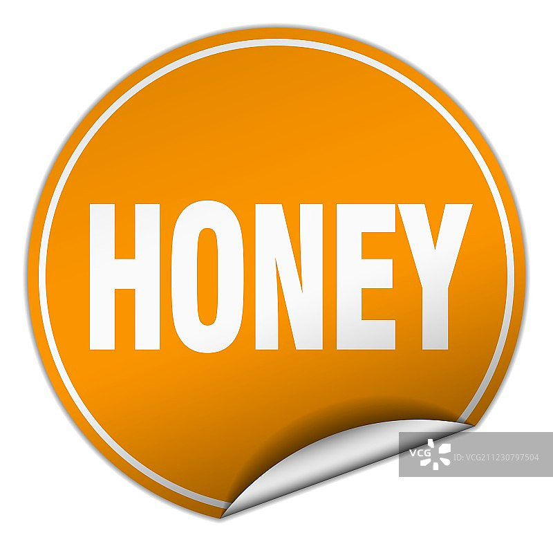白色背景上孤立的橙色蜂蜜圆形贴纸图片素材