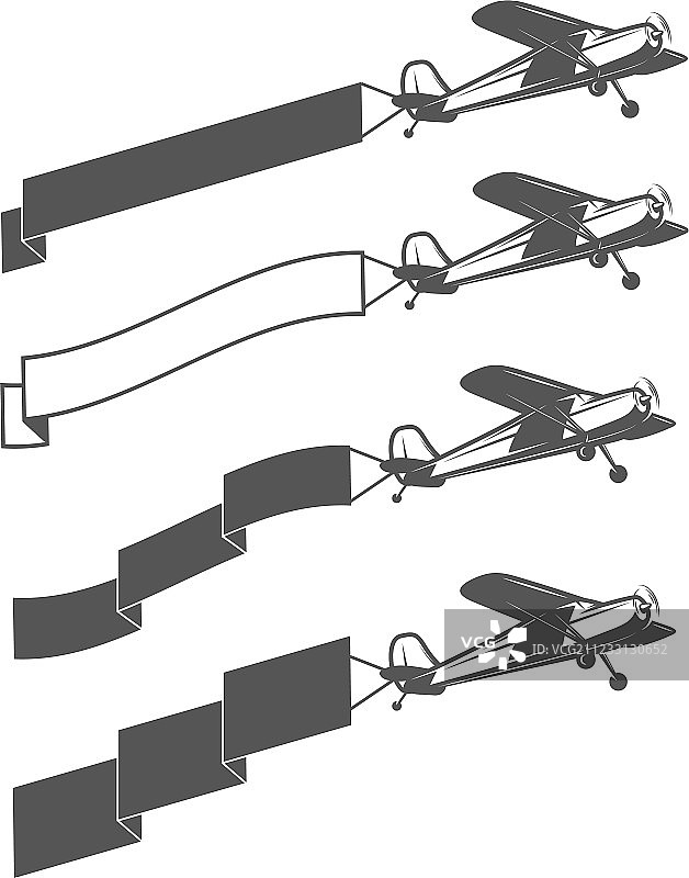 拖着空白横幅的老式小型飞机图片素材