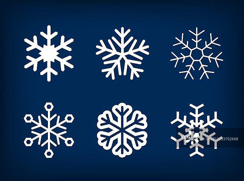 蓝色背景上的白色雪花合集图片素材