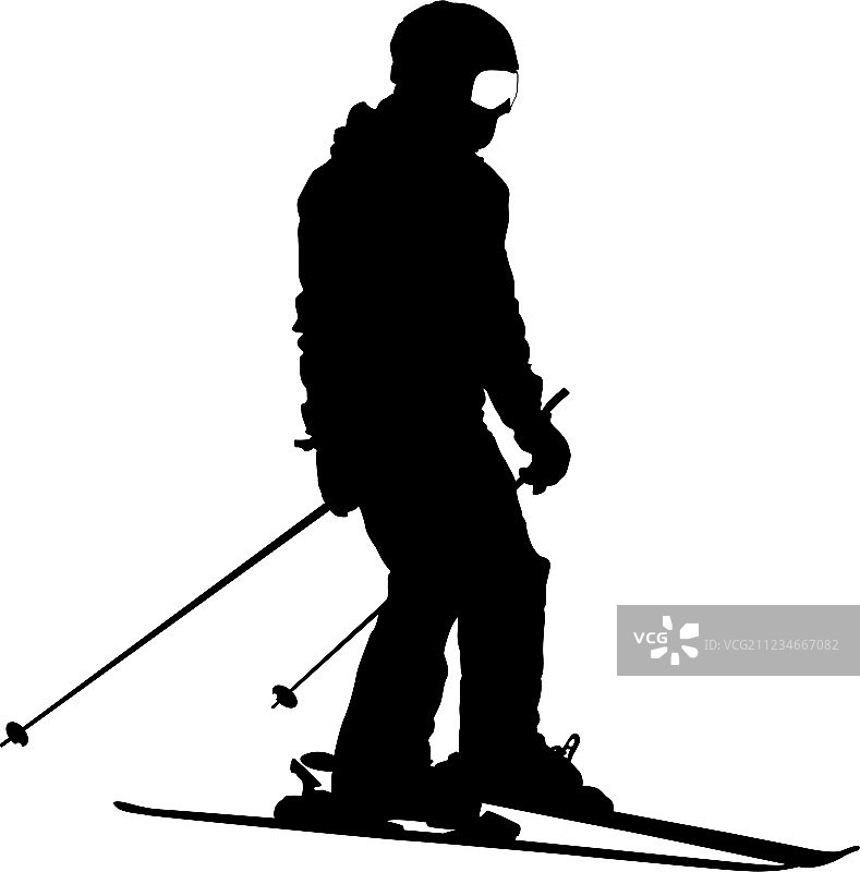 滑雪者在山坡上飞速滑下图片素材