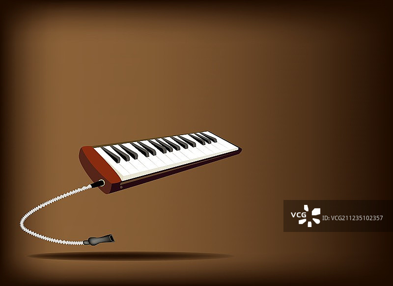 深棕色背景上的旋律口风琴图片素材