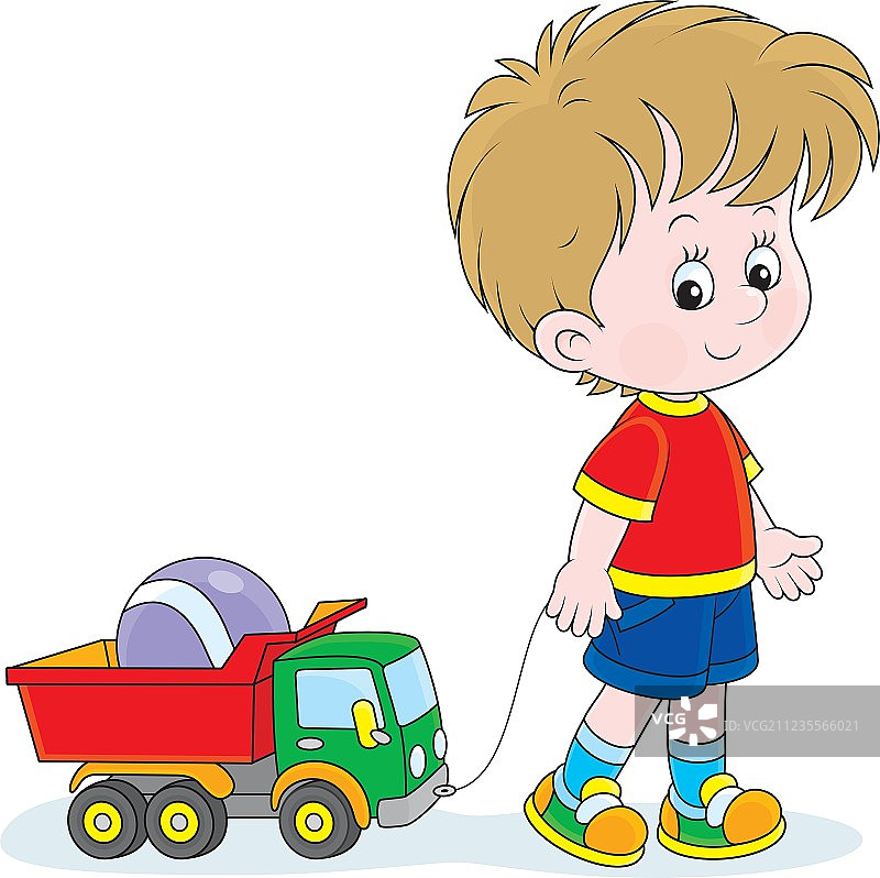男孩带着玩具走路图片素材