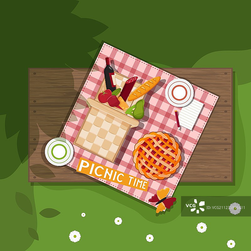 木制背景上的野餐篮图片素材