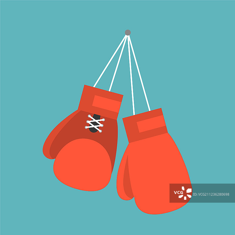 挂在墙上钉子上的红色拳击手套图片素材