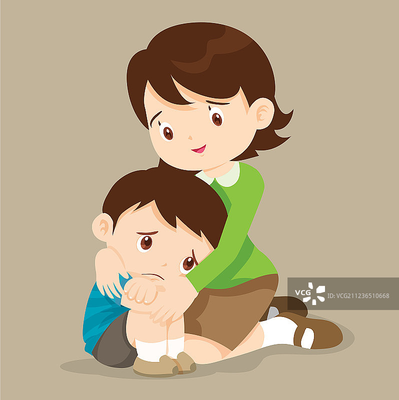 老师拥抱安慰悲伤的男孩图片素材