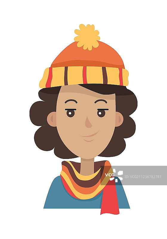 戴着橙色针织帽和围巾的棕发女子图片素材