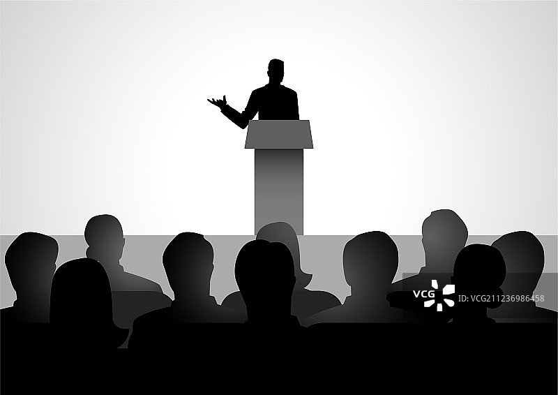 男子在舞台上演讲图片素材