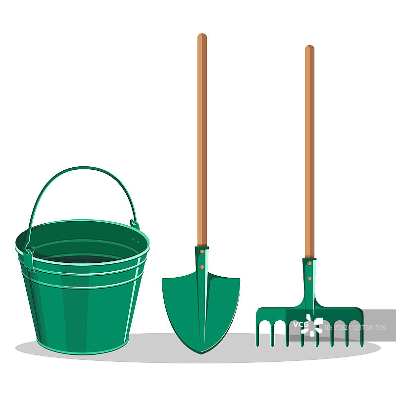 白色背景上的绿色园艺铲子和耙子图片素材