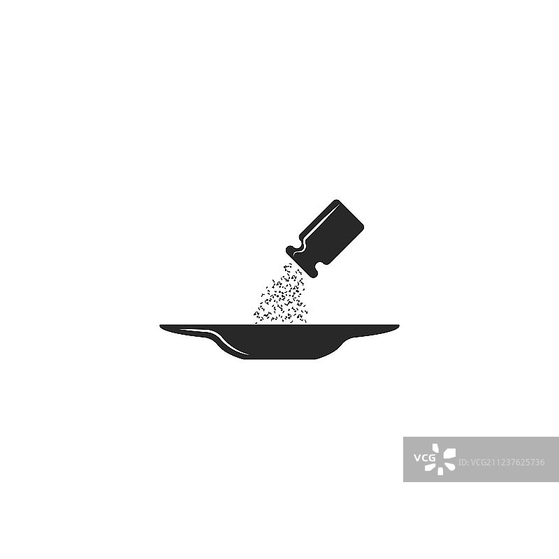 盐从盐罐滴落盘中图片素材