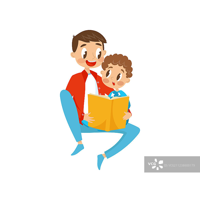 父子坐在地板上阅读图片素材