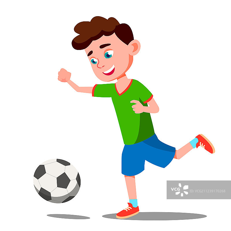 儿童在田野上踢足球图片素材