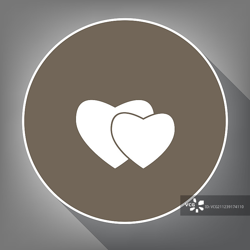 棕色背景上的两颗白色心形图标图片素材