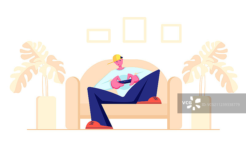 青少年用游戏手柄玩电脑游戏图片素材