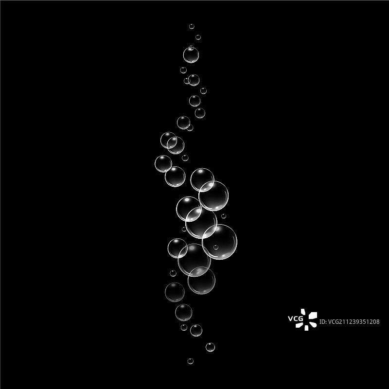 黑色背景下的水中气泡图片素材