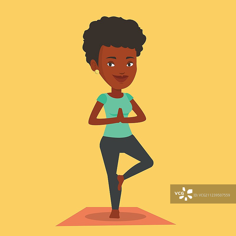 年轻女子练习瑜伽树式图片素材