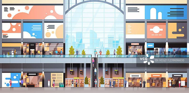 现代购物中心内部人流如织图片素材