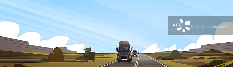 在乡村道路上行驶的大型半挂卡车图片素材