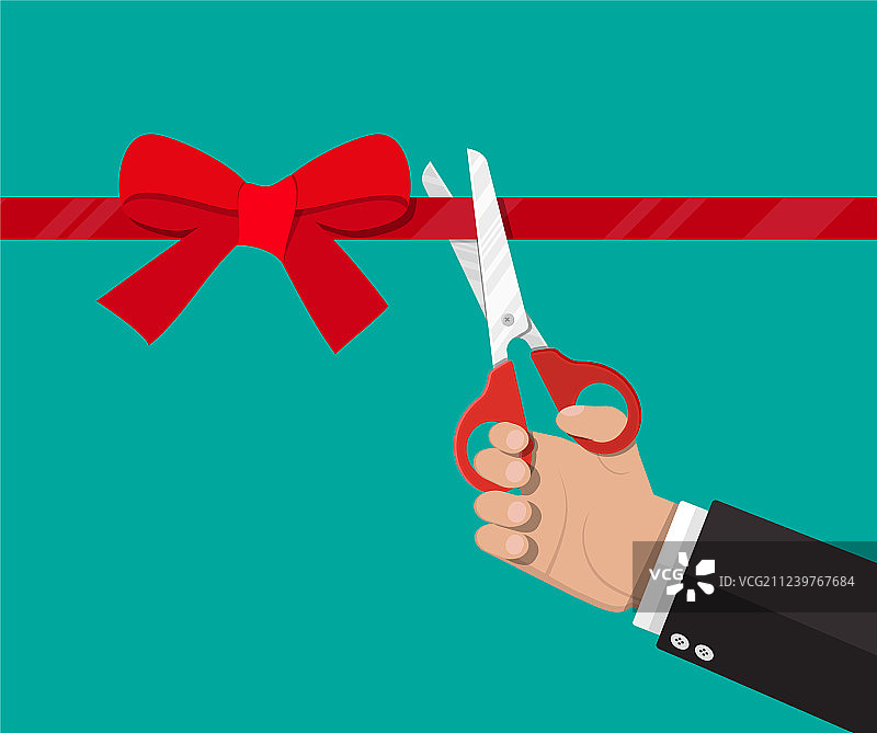 手持剪刀剪彩带图片素材