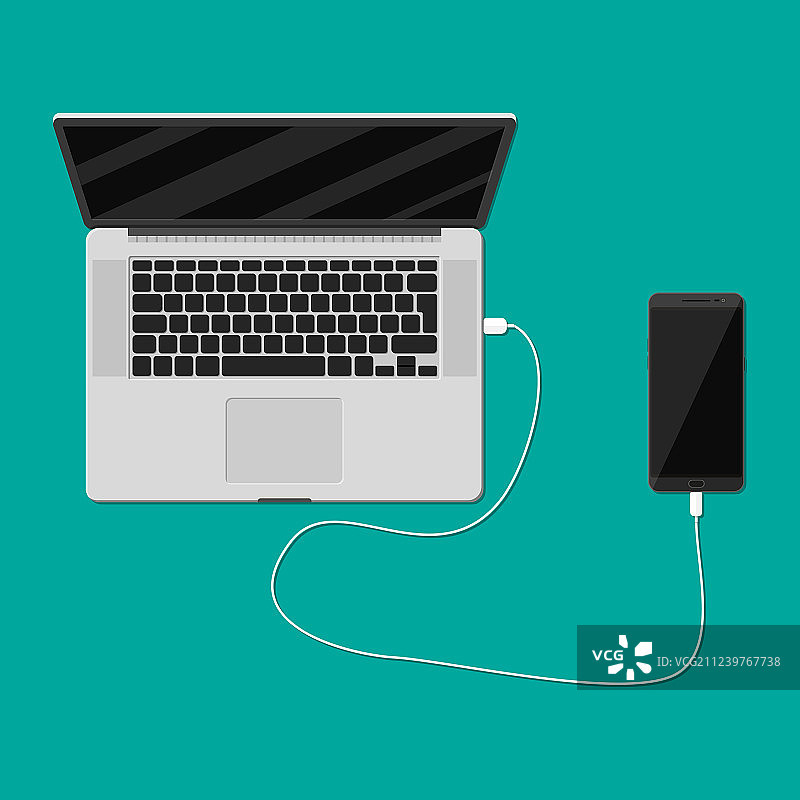 通过笔记本电脑USB端口为手机充电图片素材