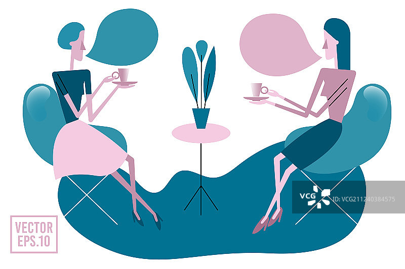 两个年轻女人坐在桌旁喝茶图片素材