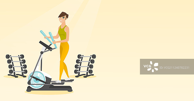 在椭圆机上锻炼的女人图片素材
