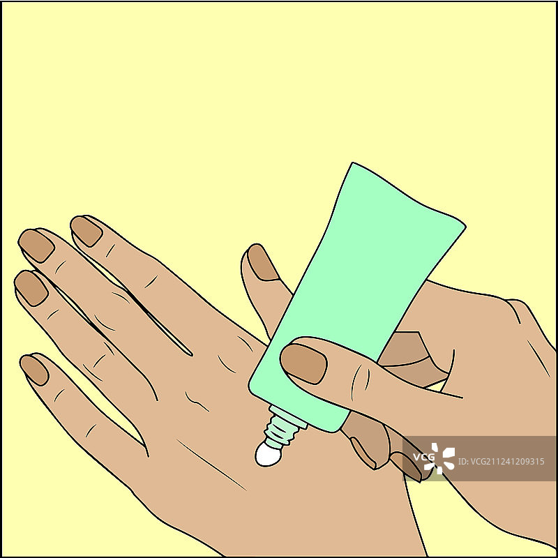 女人在黄色背景上涂抹护手霜图片素材