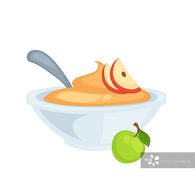 碗里装着用勺子盛着的美味甜苹果酱图片素材