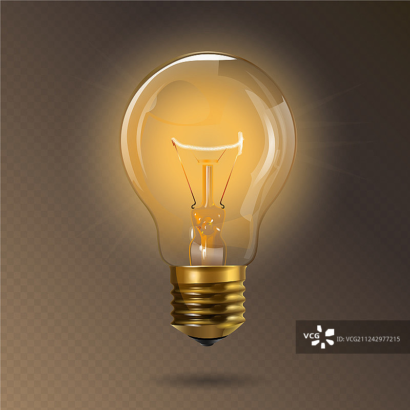 带有发光灯丝的透明灯泡图片素材