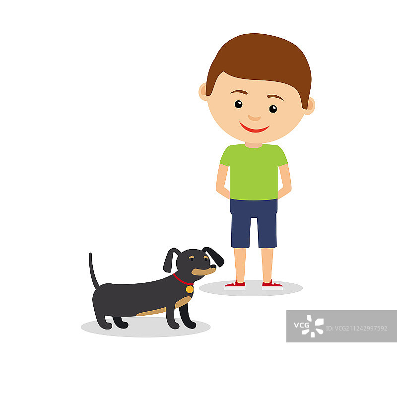 抱着腊肠犬的小男孩图片素材