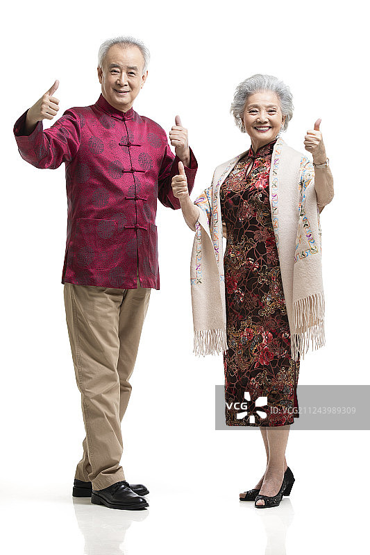 快乐的老年夫妇竖大拇指图片素材