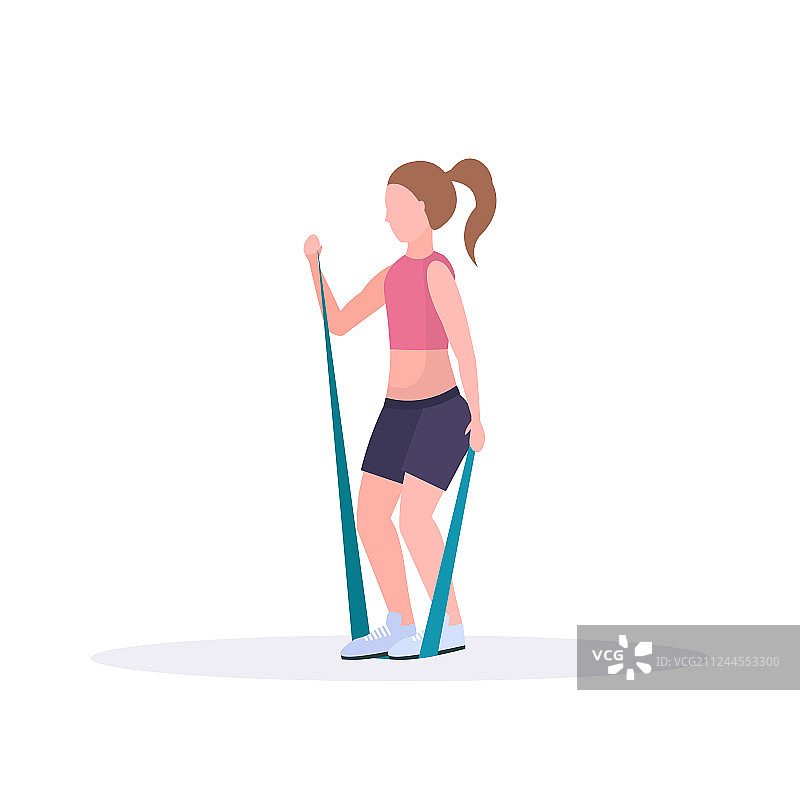 用阻力带做运动的女人图片素材