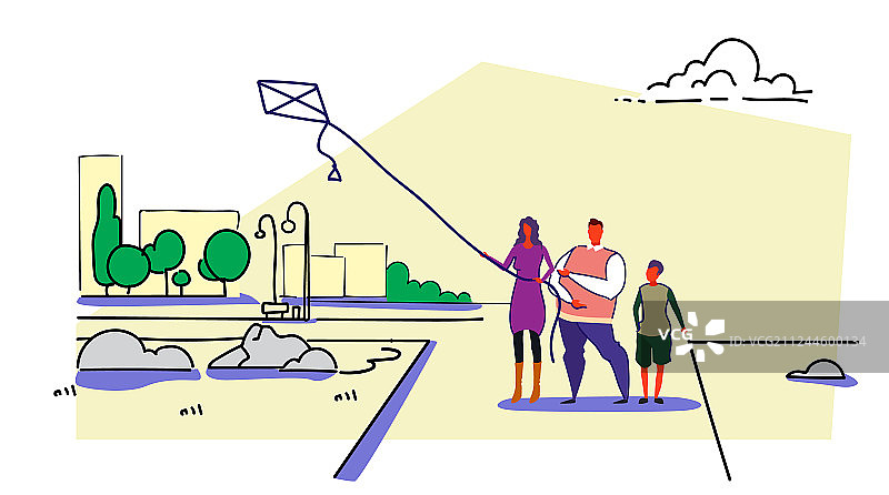 幸福家庭在城市公园放风筝图片素材