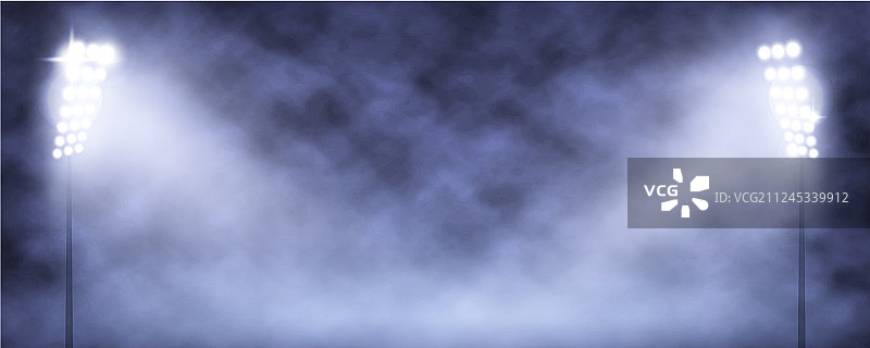 烟雾中夜晚体育场的聚光灯塔图片素材