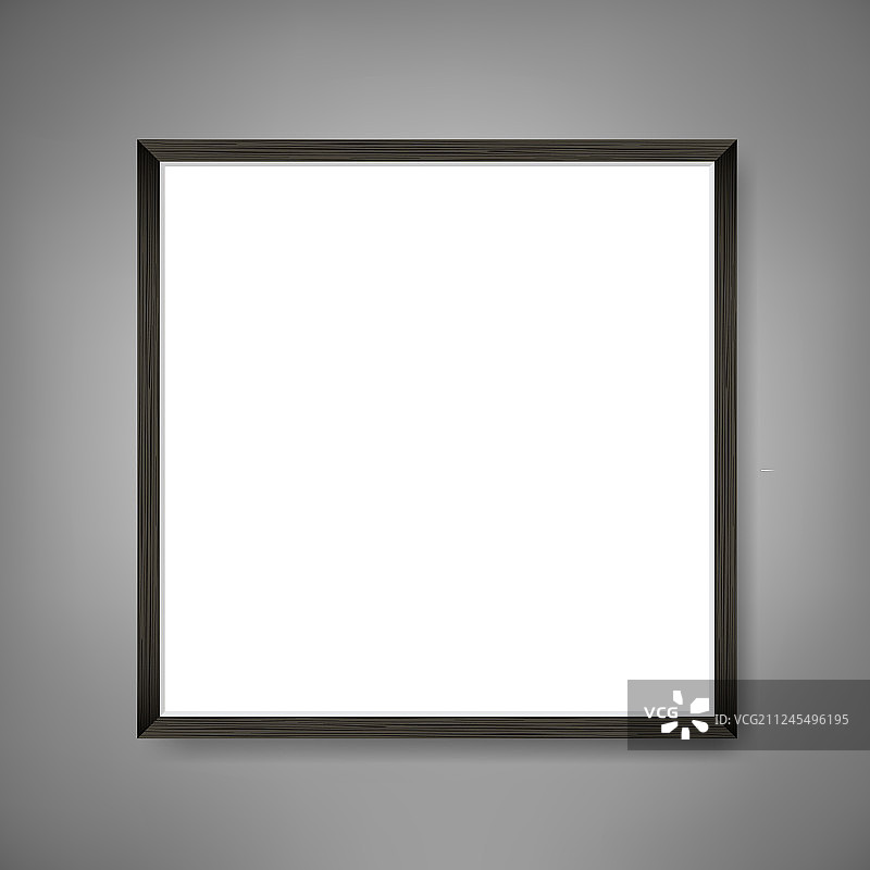 灰色墙面上的方形空白海报画框图片素材