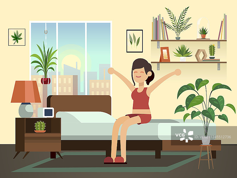 清晨快乐的年轻健康女人醒来图片素材