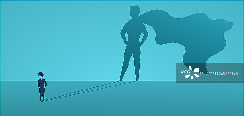 拥有超级英雄般巨大影子的商人图片素材