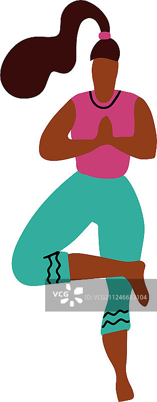 年轻女子单腿站立做瑜伽姿势图片素材