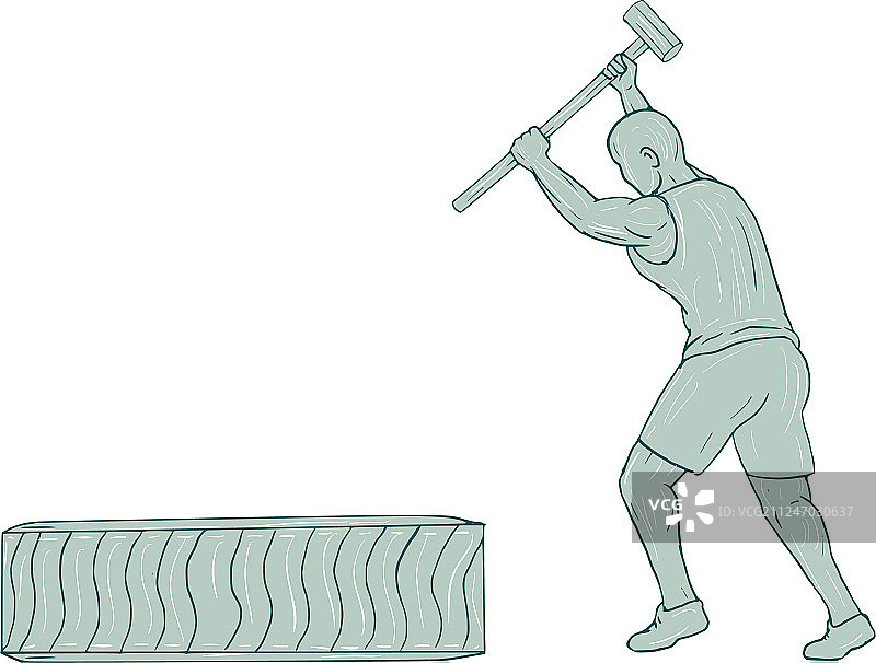 健身运动员用大锤击打轮胎图片素材