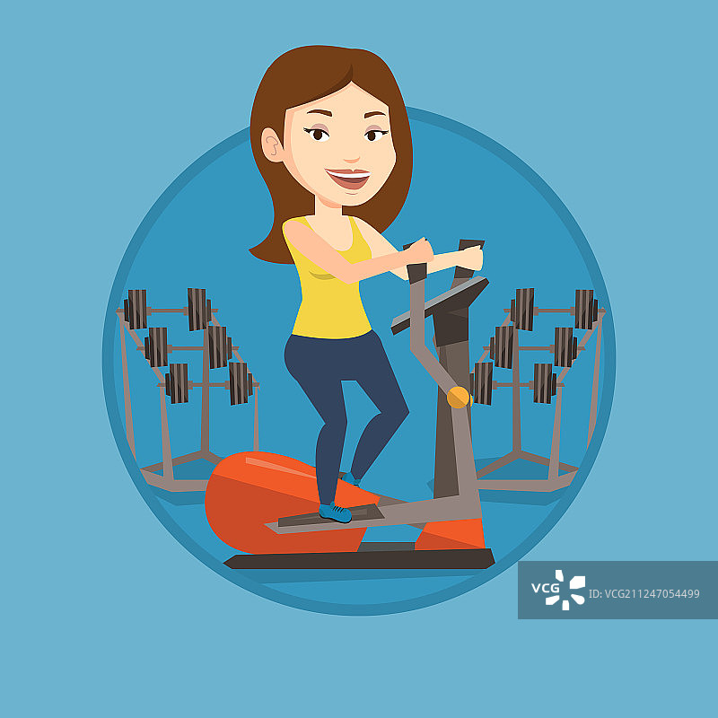 在椭圆机上锻炼的女人图片素材