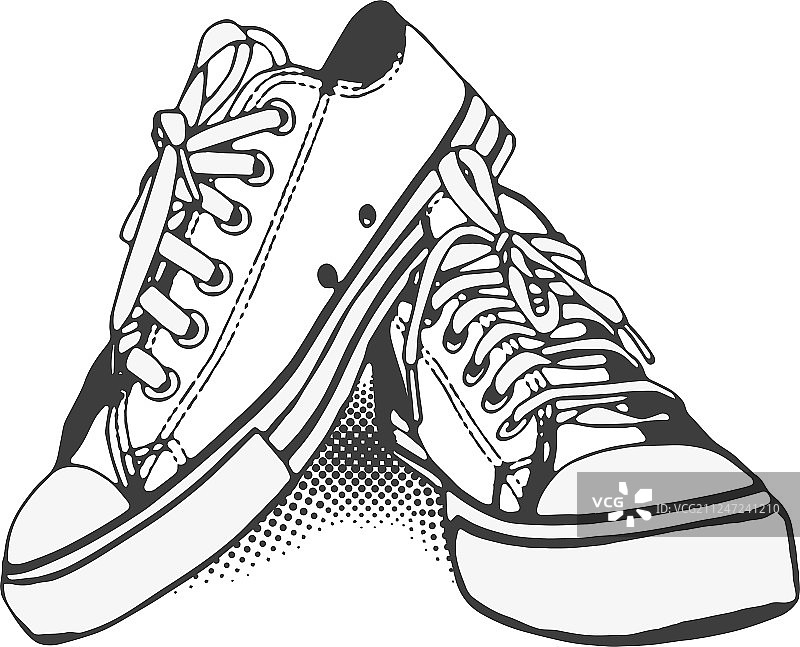白色背景上的黑白运动鞋图片素材