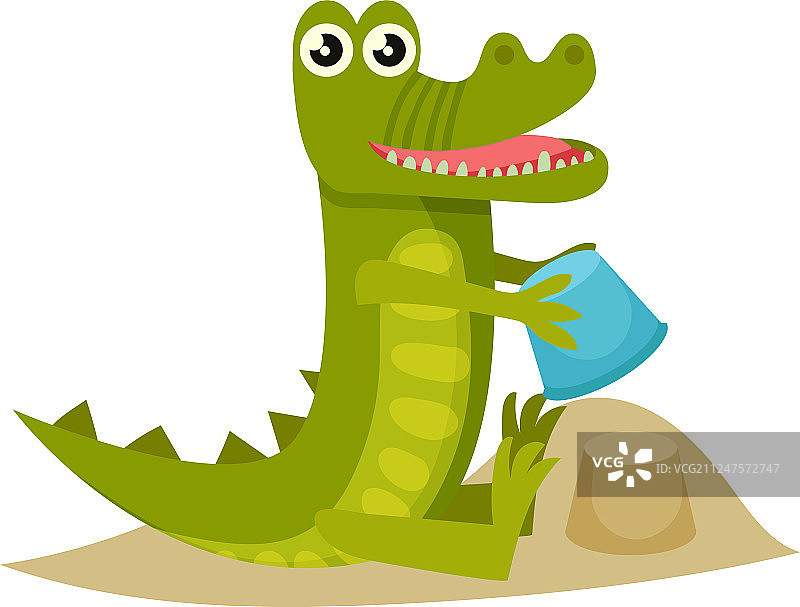 可爱的小鳄鱼在沙滩上堆沙堡图片素材