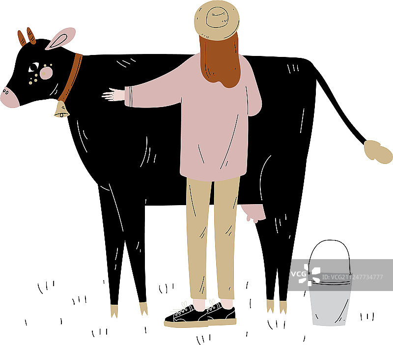 站在花斑奶牛旁边的女人图片素材