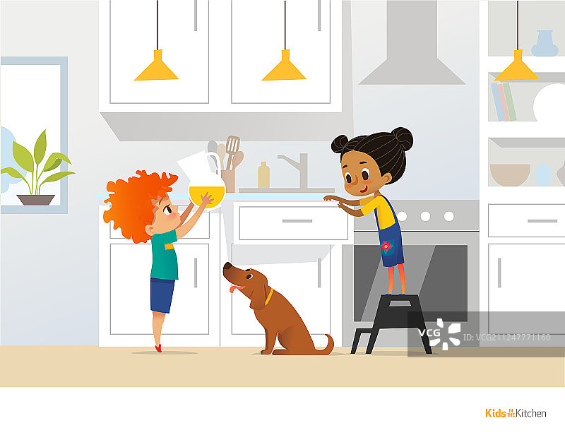 红发男孩在厨房里和孩子们一起烹饪食物图片素材