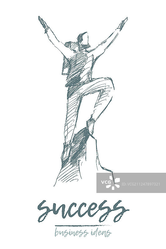 男人在山顶上举手欢呼图片素材