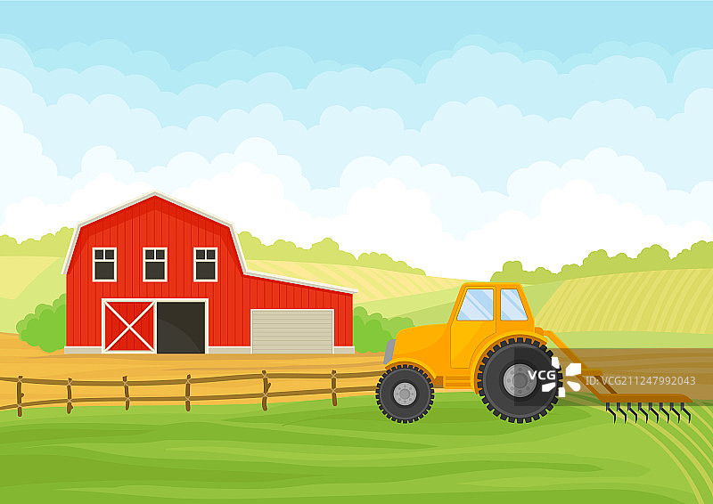 田野里的拖拉机和谷仓图片素材